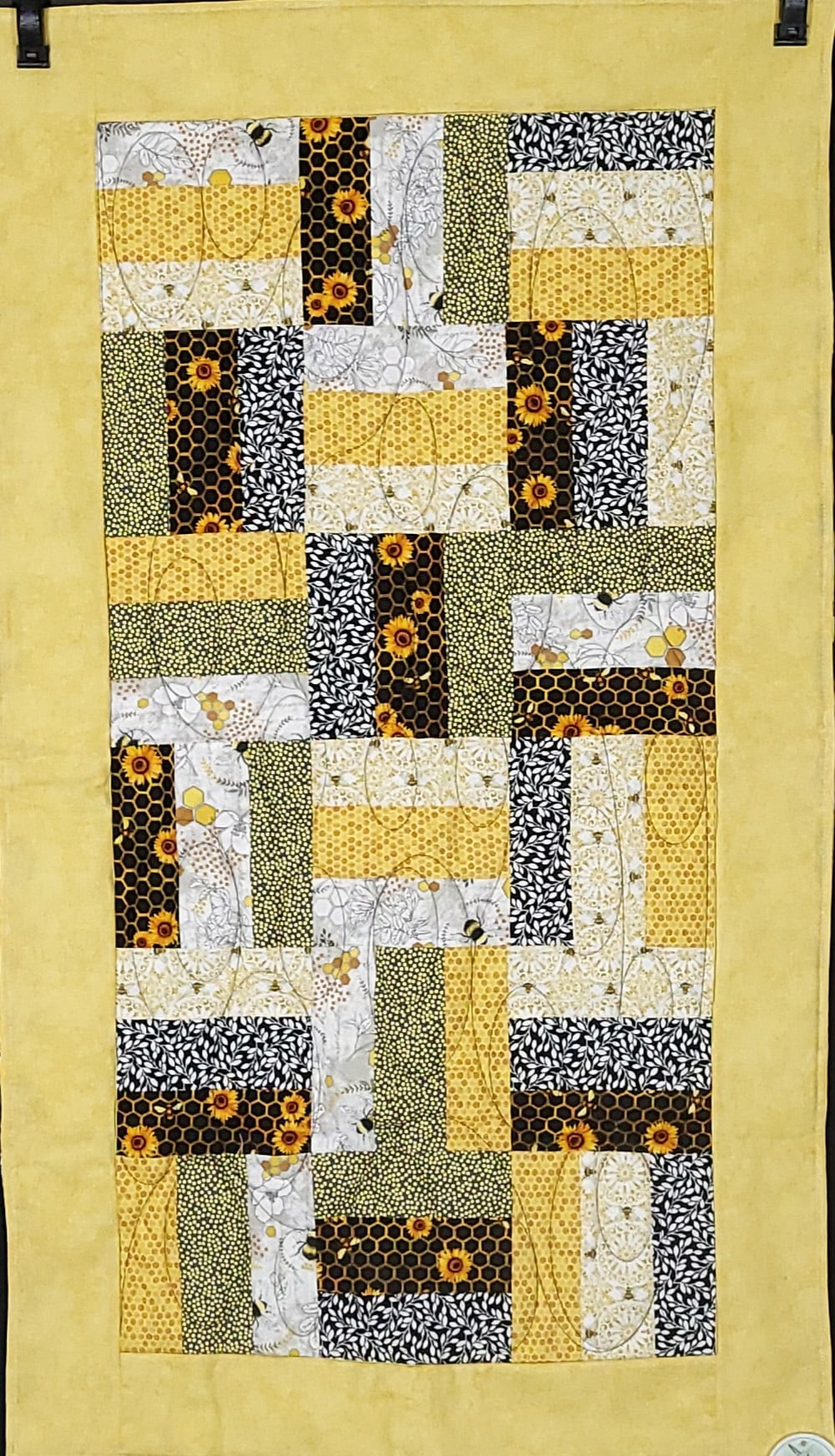 96b268_4407d3294db441f9961324e8ff05a12cmv2-1.jpeg Honeycomb table runner - Image 1