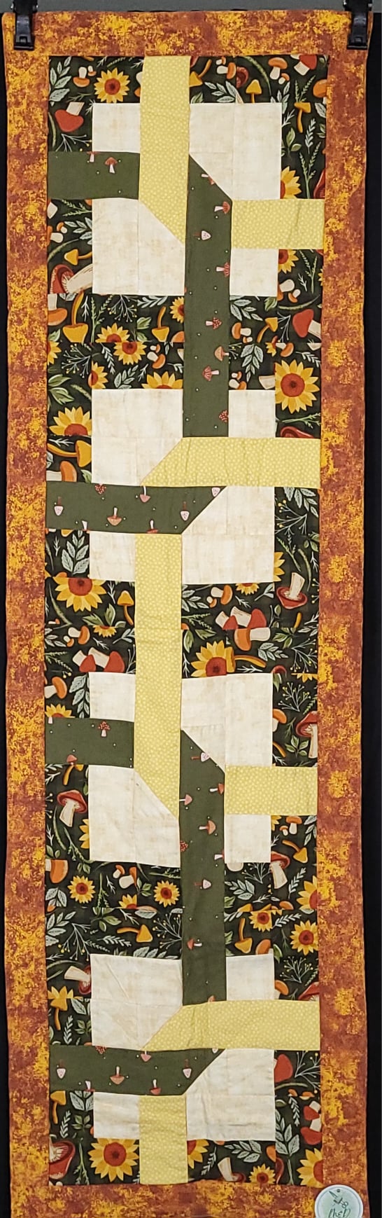 96b268_6872a62b7a3e4395abbaa8ed379197ffmv2-1.jpeg Mushroom link table runner - Image 1